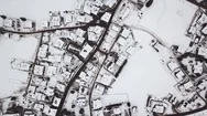 Beautiful Aerial Snowy Village Stock Footage