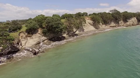 Beautiful aerial sunset view, New Zealand, Whangaparaoa peninsula at Auckland Stock Footage 101681927