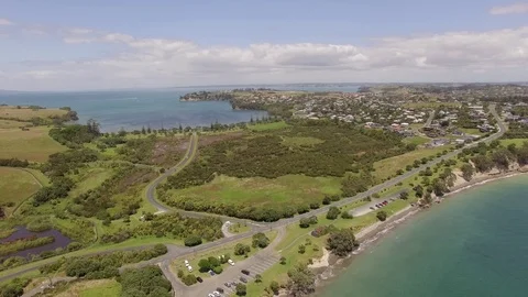Beautiful aerial sunset view, New Zealand, Whangaparaoa peninsula at Auckland Stock Footage 101682033