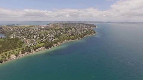 Beautiful aerial sunset view, New Zealand, Whangaparaoa peninsula at Auckland Stock Footage 101682111