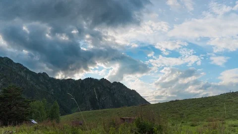 Beautiful aerial timelapse in the mountains. Clouds float across the sky. Stock Footage 111445334