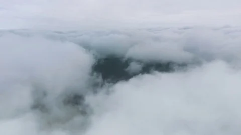 Beautiful aerial view of cloudy landscape and an island in the Lake Stock Footage 80372522
