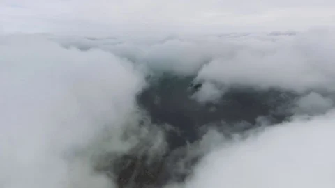 Beautiful aerial view of cloudy landscape and an island in the Lake Stock Footage 80373972