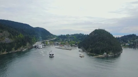 Beautiful aerial view of ferry moving in ocean. Horseshoe Bay, Canada Video stock 82448725