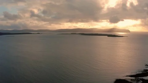 Beautiful aerial view of Isle of Skye coast at sunset with godrays Stock Footage 167692653