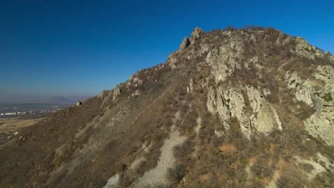 Beautiful aerial view of a mountain range with picturesque rocks. Stock Footage 263319775