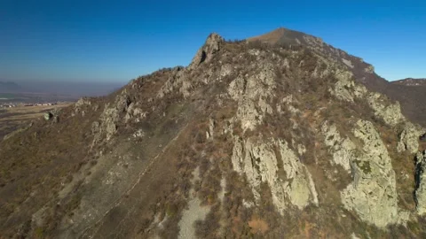 Beautiful aerial view of a mountain range with picturesque rocks. Stock Footage 263319852