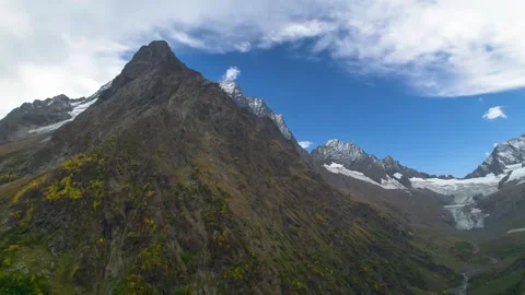 Beautiful aerial view of a mountain range with picturesque peaks. Stock Footage 263363758