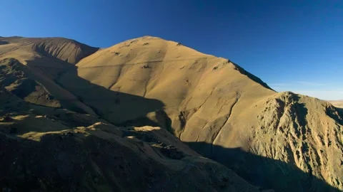 Beautiful aerial view of a mountain range with picturesque peaks. Stock Footage 263593189