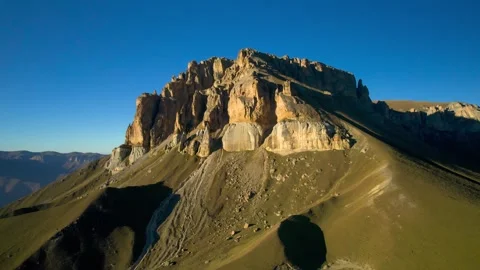 Beautiful aerial view of a mountain range with high cliffs. Stock Footage 293946756