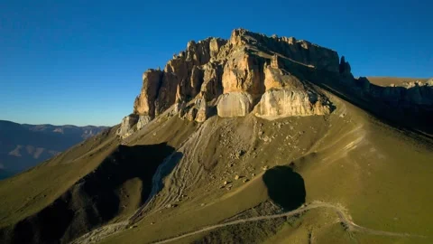 Beautiful aerial view of a mountain range with high cliffs. Stock Footage 293946760