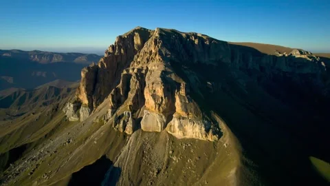 Beautiful aerial view of a mountain range with high cliffs. Stock Footage 293947000