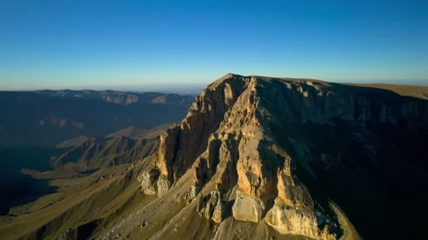 Beautiful aerial view of a mountain range with high cliffs. Stock Footage 293947002