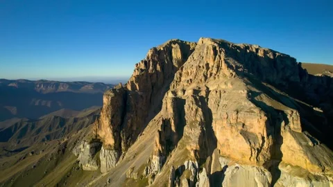 Beautiful aerial view of a mountain range with high cliffs. Stock Footage 293947003