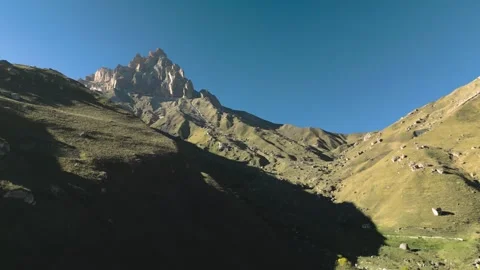 Beautiful aerial view of a mountain range with high cliffs. Stock Footage 293947094