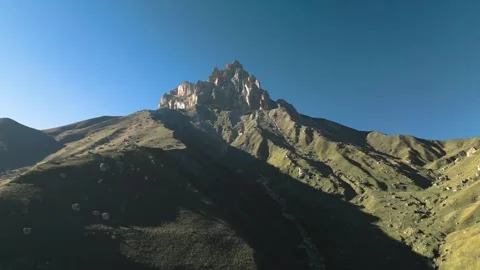 Beautiful aerial view of a mountain range with high cliffs. Stock Footage 293947096