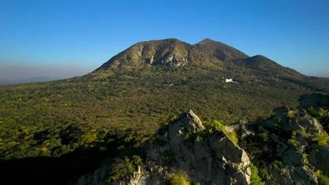 Beautiful aerial view of a mountain range with high cliffs. Stock Footage 293947474