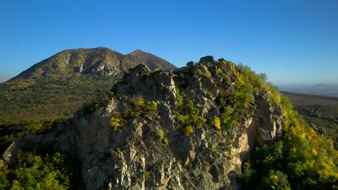 Beautiful aerial view of a mountain range with high cliffs. Stock Footage 293947501