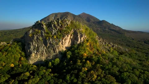 Beautiful aerial view of a mountain range with high cliffs. Stock Footage 293947629