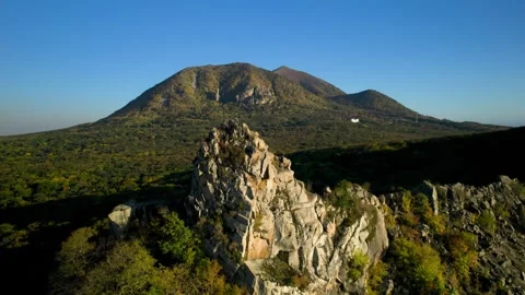 Beautiful aerial view of a mountain range with high cliffs. Stock Footage 293947734