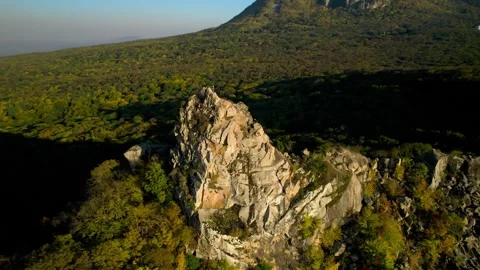Beautiful aerial view of a mountain range with high cliffs. Stock Footage 293947738