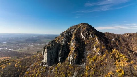 Beautiful aerial view of a mountain range with high cliffs. Stock Footage 293947818