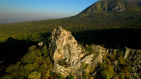 Beautiful aerial view of a mountain range with high cliffs. Stock Footage 293947821