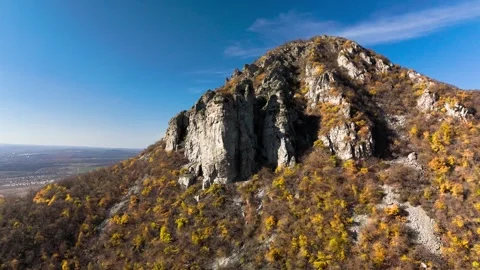 Beautiful aerial view of a mountain range with high cliffs. Stock Footage 293947885