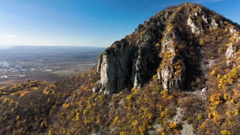 Beautiful aerial view of a mountain range with high cliffs. Stock Footage 293947894