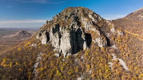 Beautiful aerial view of a mountain range with high cliffs. Stock Footage 293947905