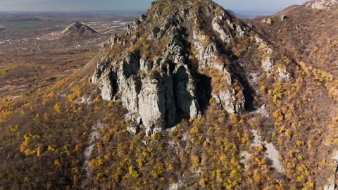 Beautiful aerial view of a mountain range with high cliffs. Stock Footage 293947933