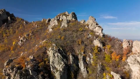 Beautiful aerial view of a mountain range with high cliffs. Stock Footage 293947962