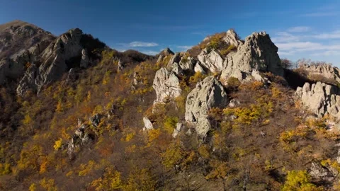 Beautiful aerial view of a mountain range with high cliffs. Stock Footage 293947973