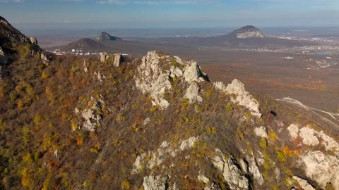 Beautiful aerial view of a mountain range with high cliffs. Stock Footage 293948042