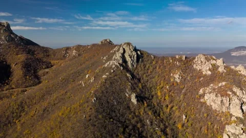 Beautiful aerial view of a mountain range with high cliffs. Stock Footage 293948071