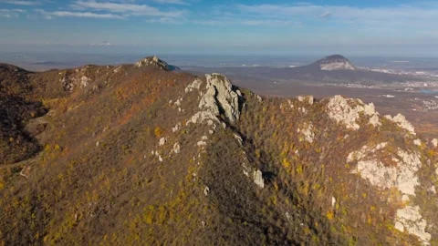 Beautiful aerial view of a mountain range with high cliffs. Stock Footage 293948089