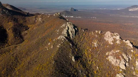 Beautiful aerial view of a mountain range with high cliffs. Stock Footage 293948090
