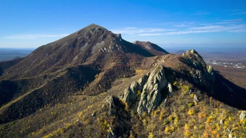 Beautiful aerial view of a mountain range with high cliffs. Stock Footage 293948259