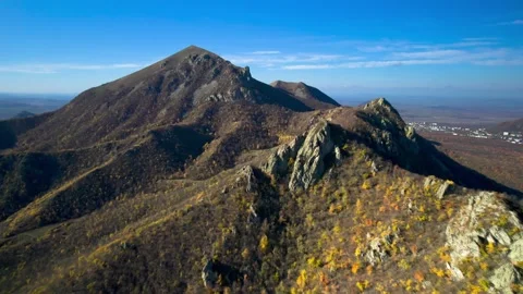 Beautiful aerial view of a mountain range with high cliffs. Stock Footage 293948290