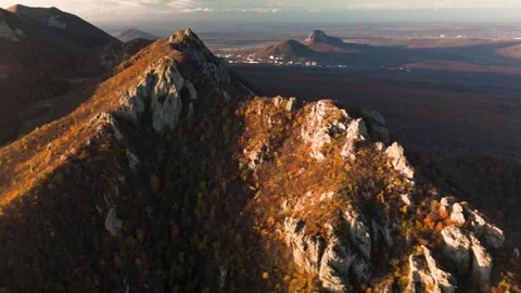 Beautiful aerial view of a mountain range with high cliffs. Stock Footage 293949179