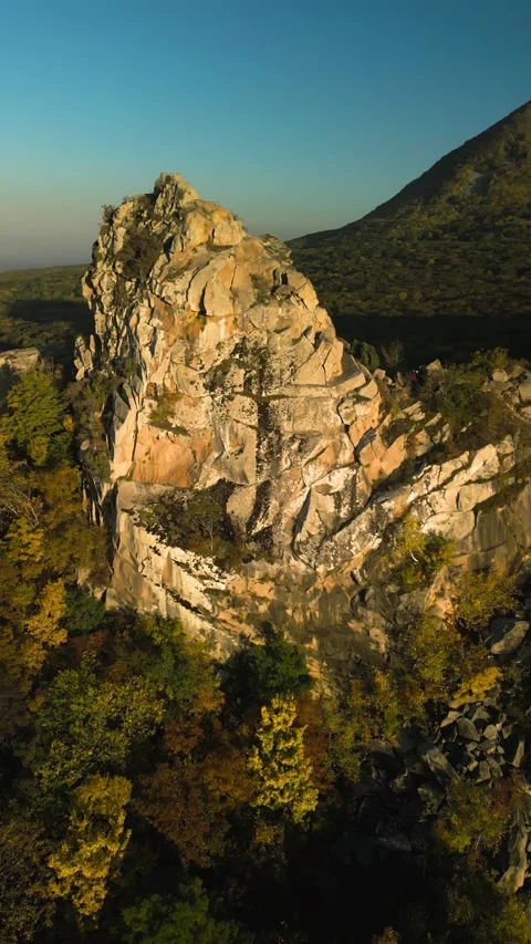 Beautiful aerial view of a mountain range with high cliffs. Stock Footage 293949628
