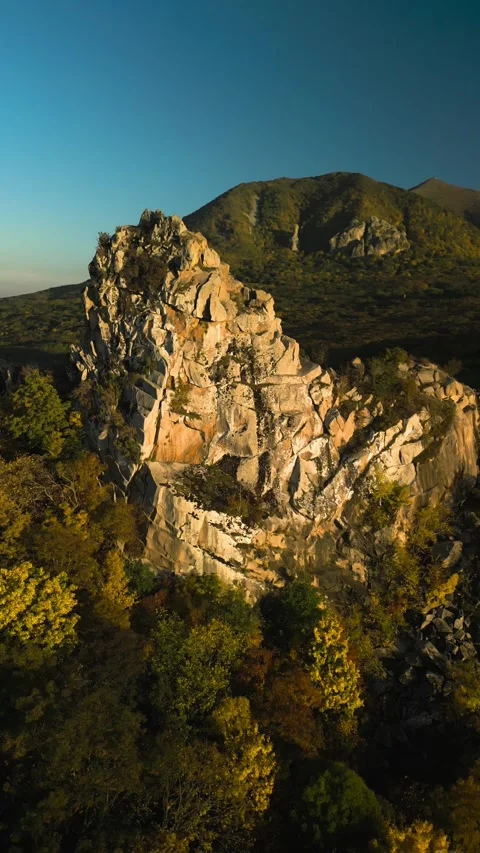 Beautiful aerial view of a mountain range with high cliffs. Stock Footage 293949638
