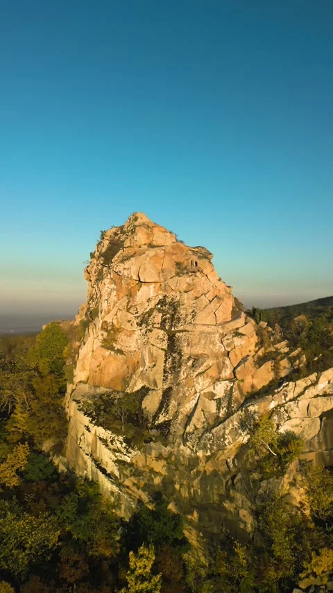 Beautiful aerial view of a mountain range with high cliffs. Stock Footage 293949919