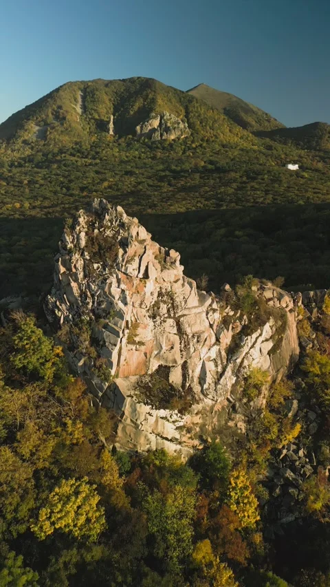 Beautiful aerial view of a mountain range with high cliffs. Stock Footage 293949920