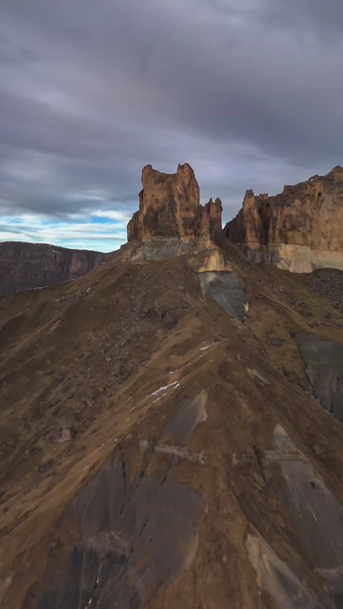 Beautiful aerial view of a mountain range with high cliffs. Stock Footage 293950192