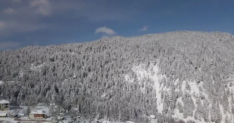 Beautiful aerial view of small ski resort village Mitarbi Stock Footage 125459302