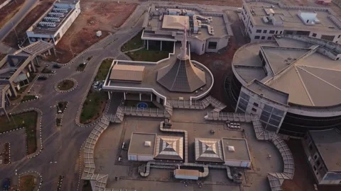 Beautiful aerial view of the statue in front of the NILDS building and Stock Footage 328857466