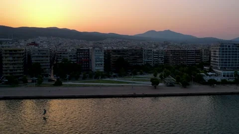 Beautiful aerial view of sunrise over Thessaloniki Stock Footage 211421753