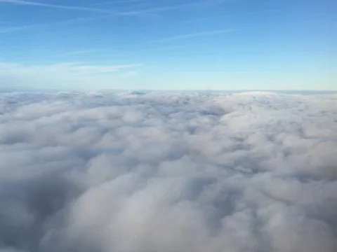 Beautiful Aerial View of Vast Cloud Bank from Commercial Flight (4K) Stock Footage 79796321