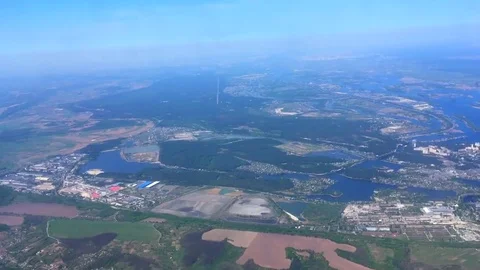 Beautiful aerial view. The village, the fields and the river Stock Footage